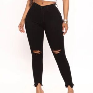 Distressed Black Jeans with Frayed Hem